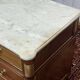 Louis XVI commode in mahogany with a marble top from the 1950s.