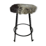 Vintage stool lined with cowhide