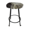 Vintage stool lined with cowhide