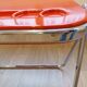Vintage lot design – Platone table + red Plia chairs – Anonima Castelli