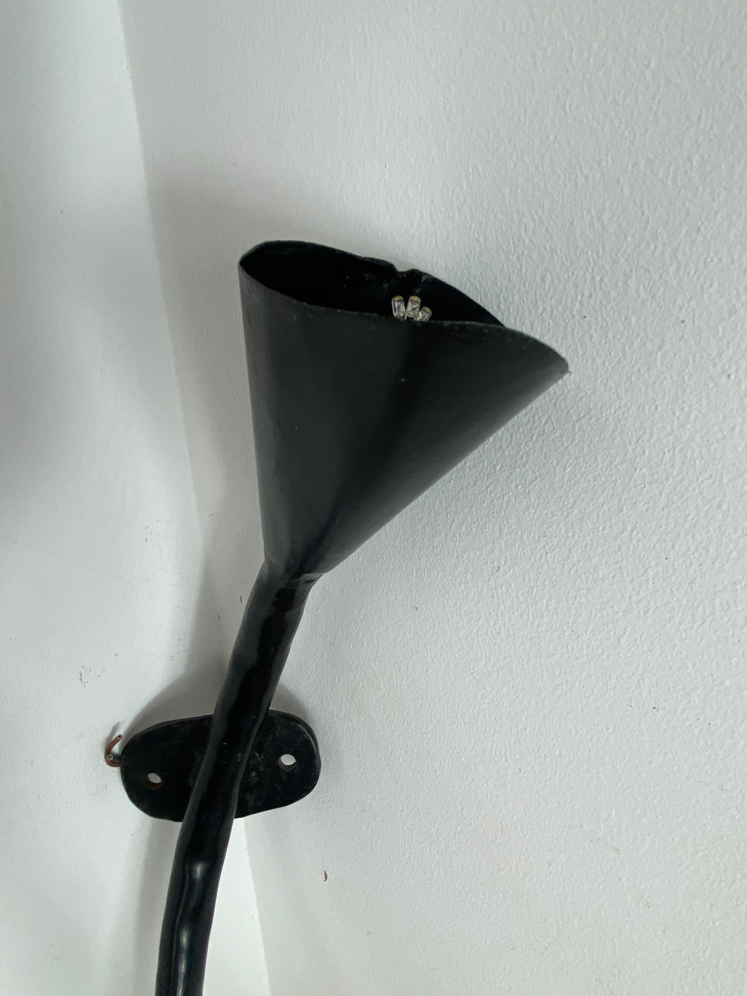 Wrought iron wall sconce