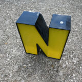 Yellow and black industrial sign letter "N"