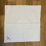 Cotton napkin edged by hand with flowers, France
