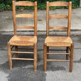 2 solid wood chairs in dark oak and high elephant straw