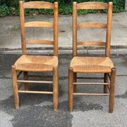 2 solid wood chairs in dark oak and high elephant straw