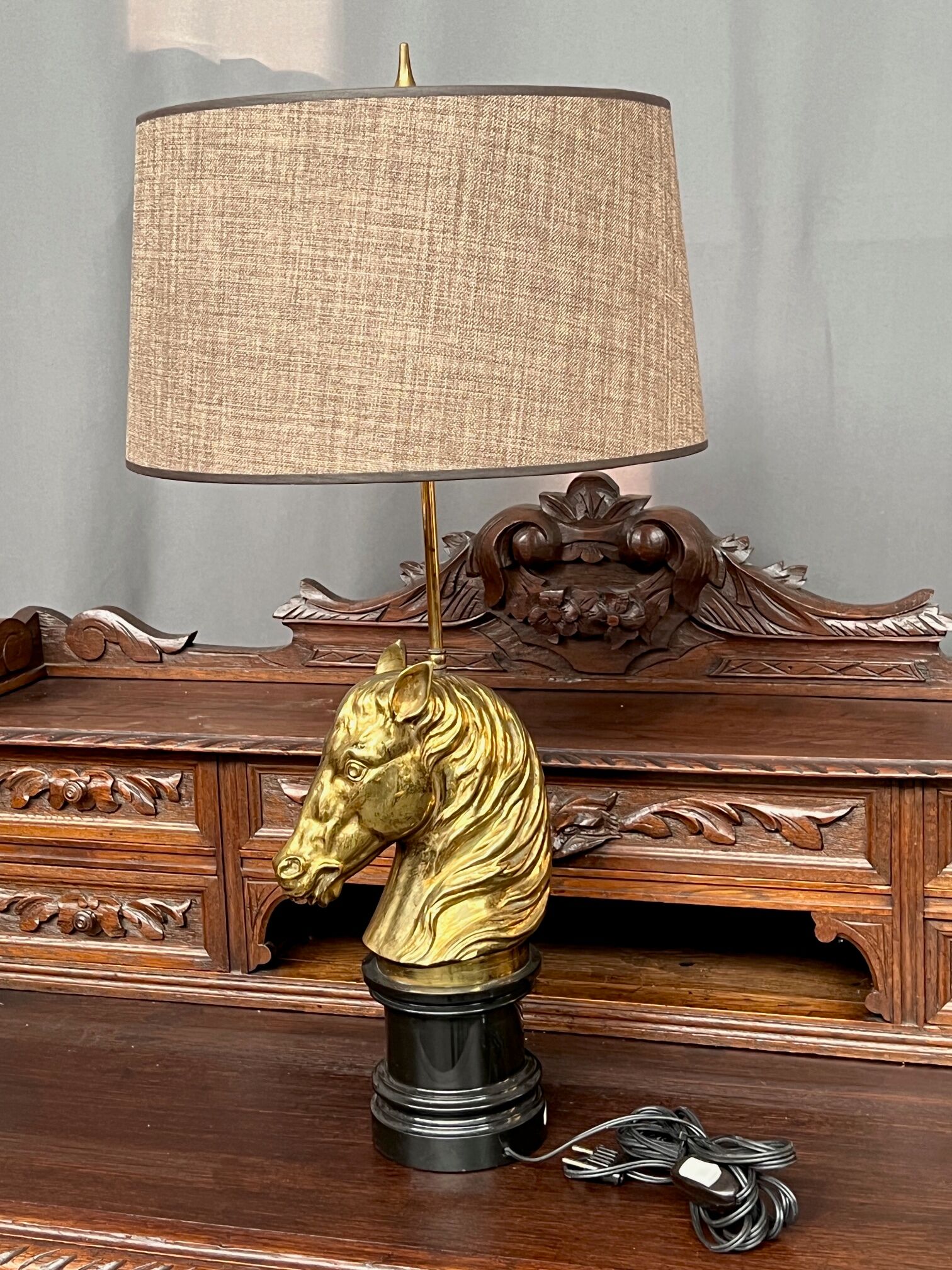 Table lamp made of solid bronze on a marble base.