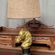 Table lamp made of solid bronze on a marble base.