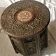 Ancient oriental pedestal table in carved wood