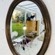 Vintage oval mirror Syla model 920 from the 1970s.