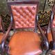 Suite de 4 fauteuils époque Restauration cuir et acajou