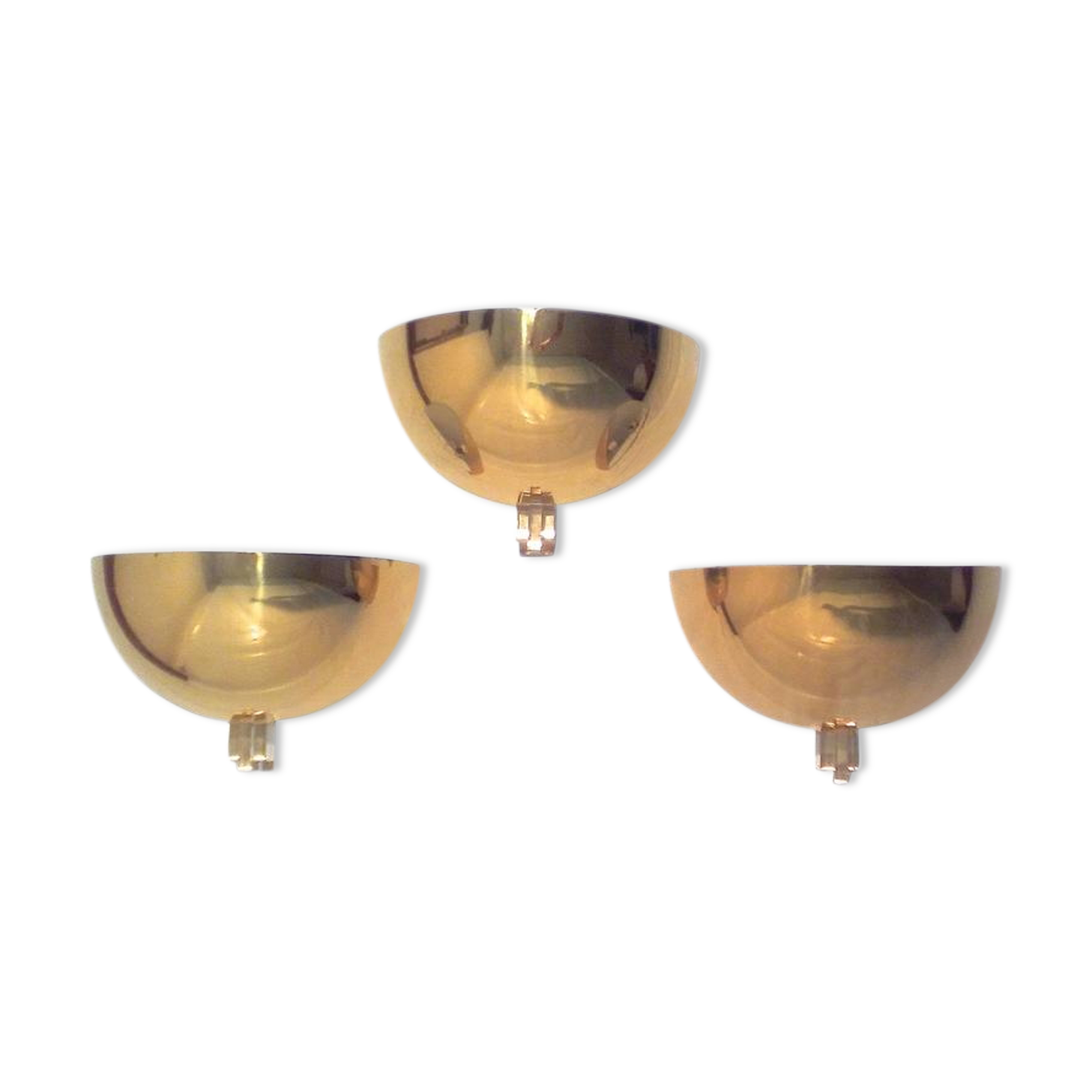 Three brass and lucite wall lights