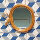 Miroir rotin vintage en forme de pomme