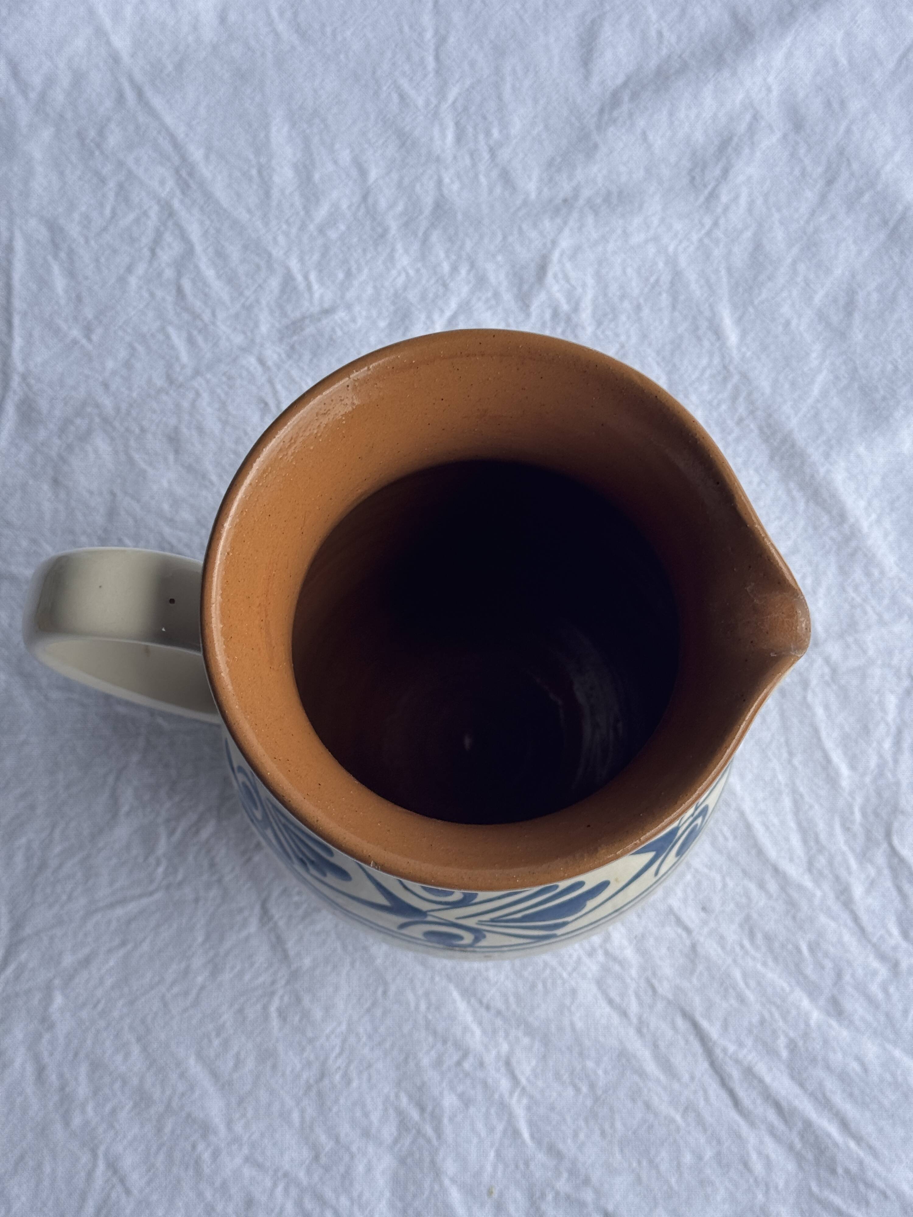 Vintage white pitcher with stylized blue plant frieze H17.5