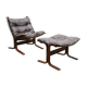 Scandinavian armchair and ottoman Siesta in brown leather by Ingmar Relling for Westnofa editions