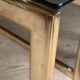 Table basse en métal doré et verre fumé vintage