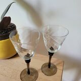 Two smoked black stem wine glasses