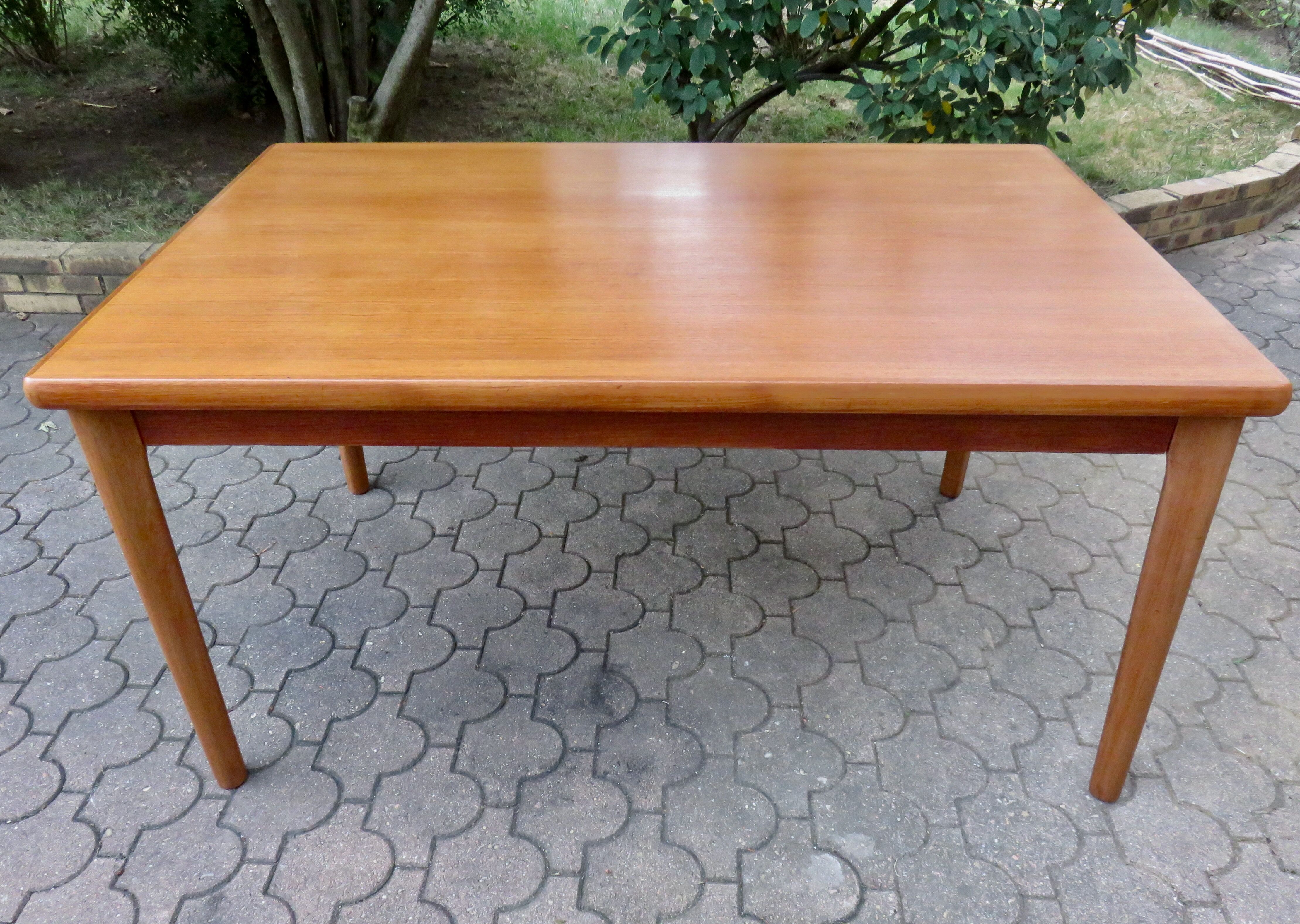 Extendable teak table by Henning Kjaernulf, Denmark 1960