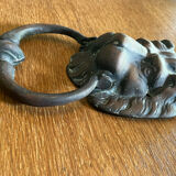 Lion head door knocker