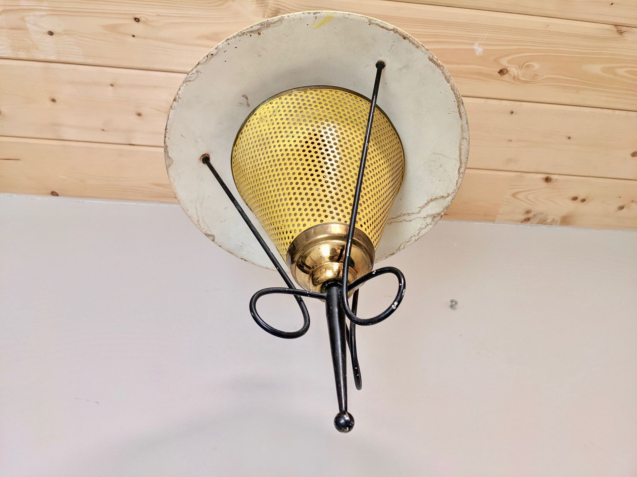 Suspension in perforated sheet metal