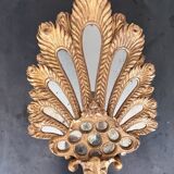 Palm-shaped faceted mirror