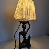 Ebony lamp with seated woman / 1930s
