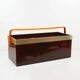 Italian magazine rack in 'faux tortoiseshell' and brass