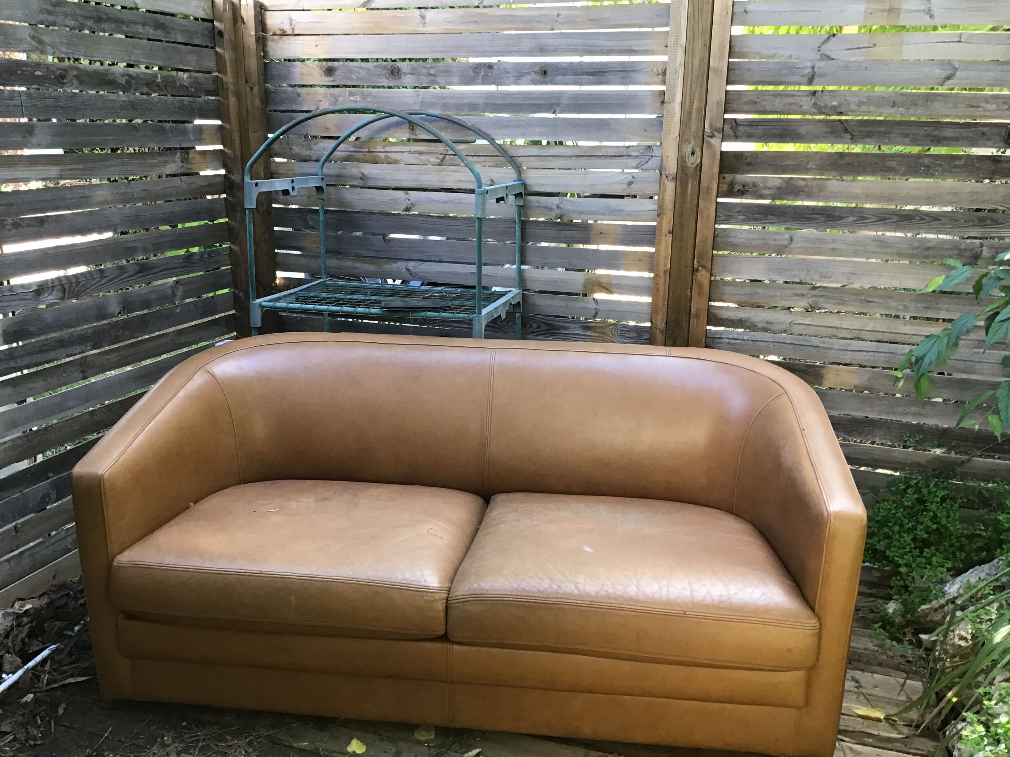 Two-seater leather sofa