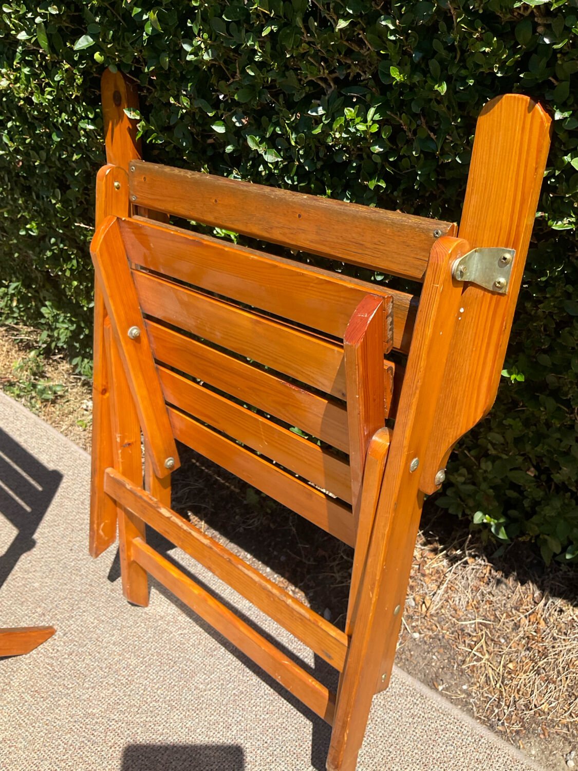 Pair of vintage wooden folding armchairs