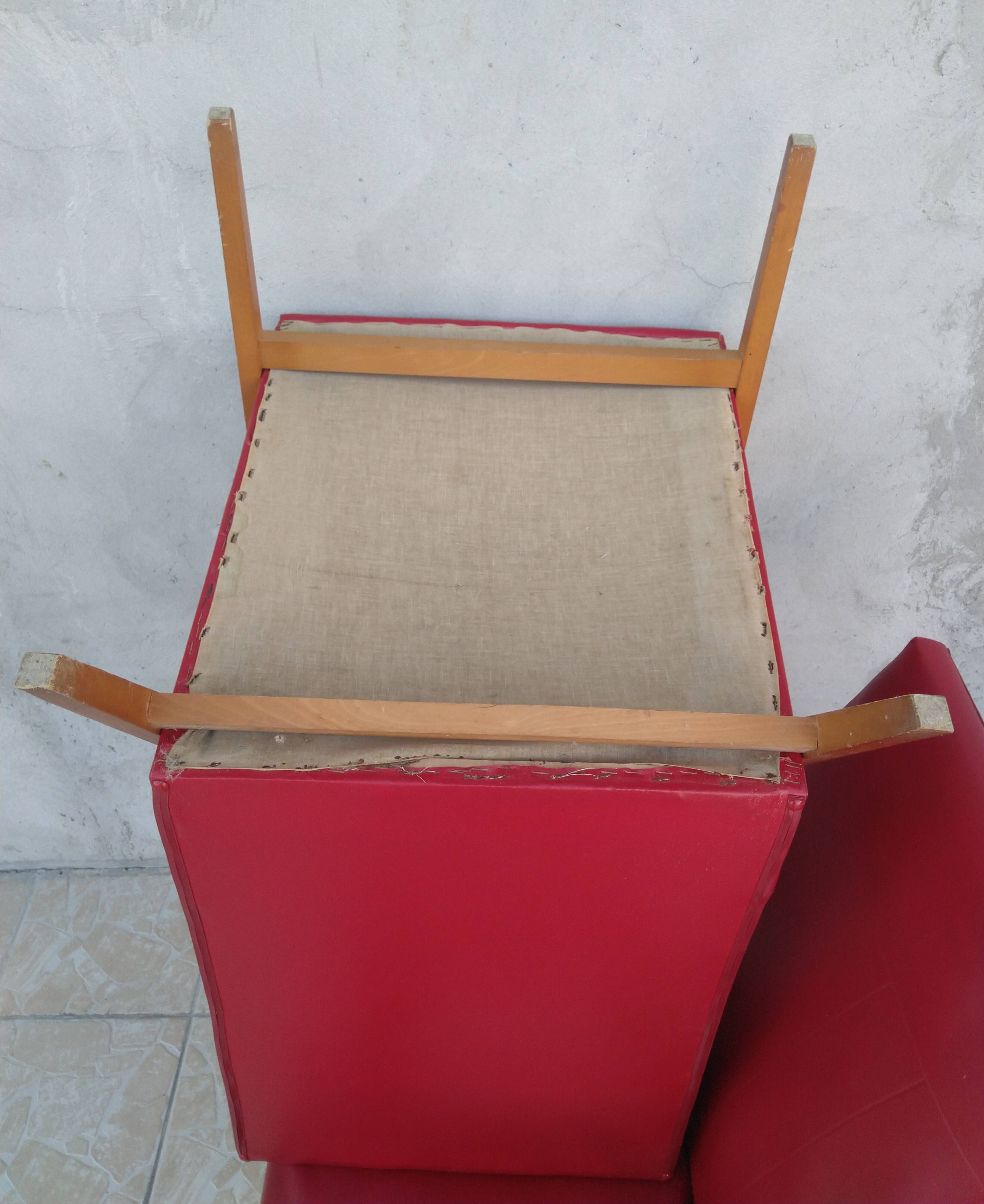 Paire de fauteuils vintage en skaï