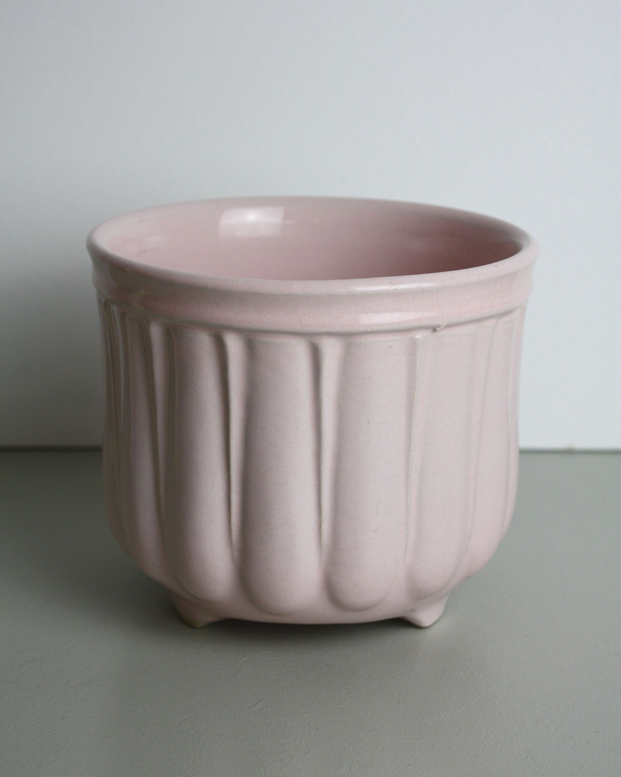 Pink glazed ceramic pot cover