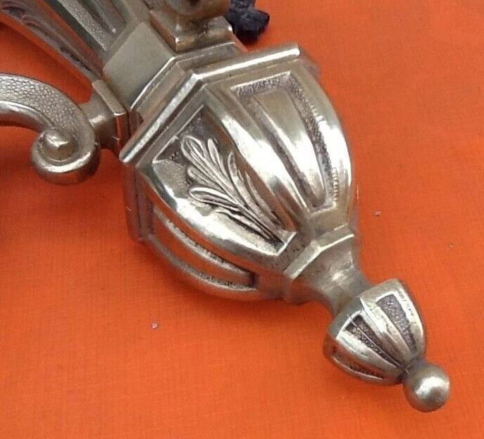 Large wall sconce in LXV style, patinated bronze.