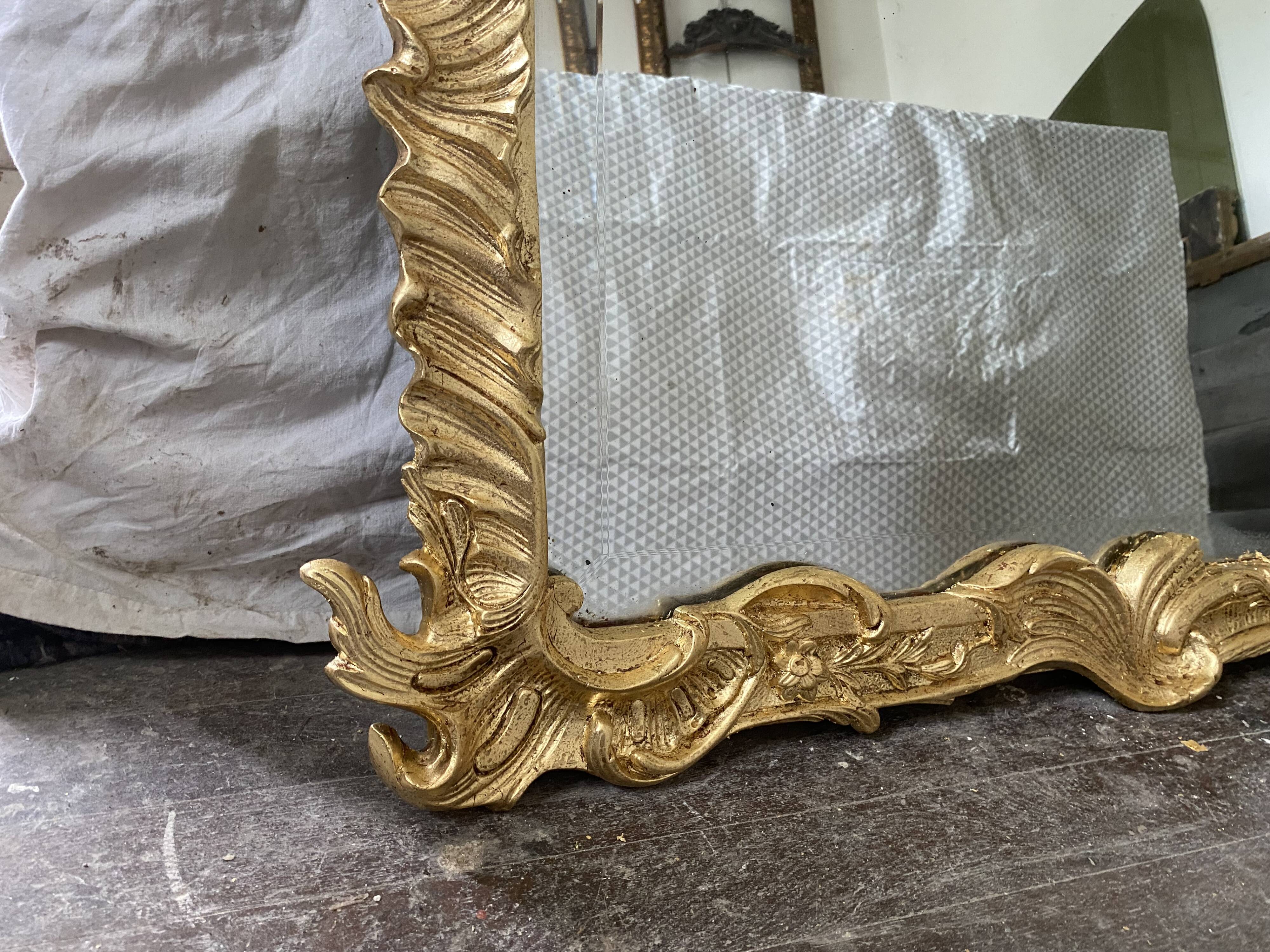 19th century gilded mirror with pediment