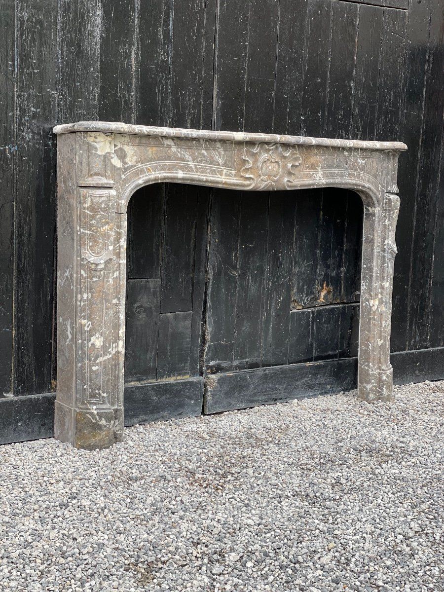 Fireplace louis xv in grey marble of the ardennes late eighteenth century