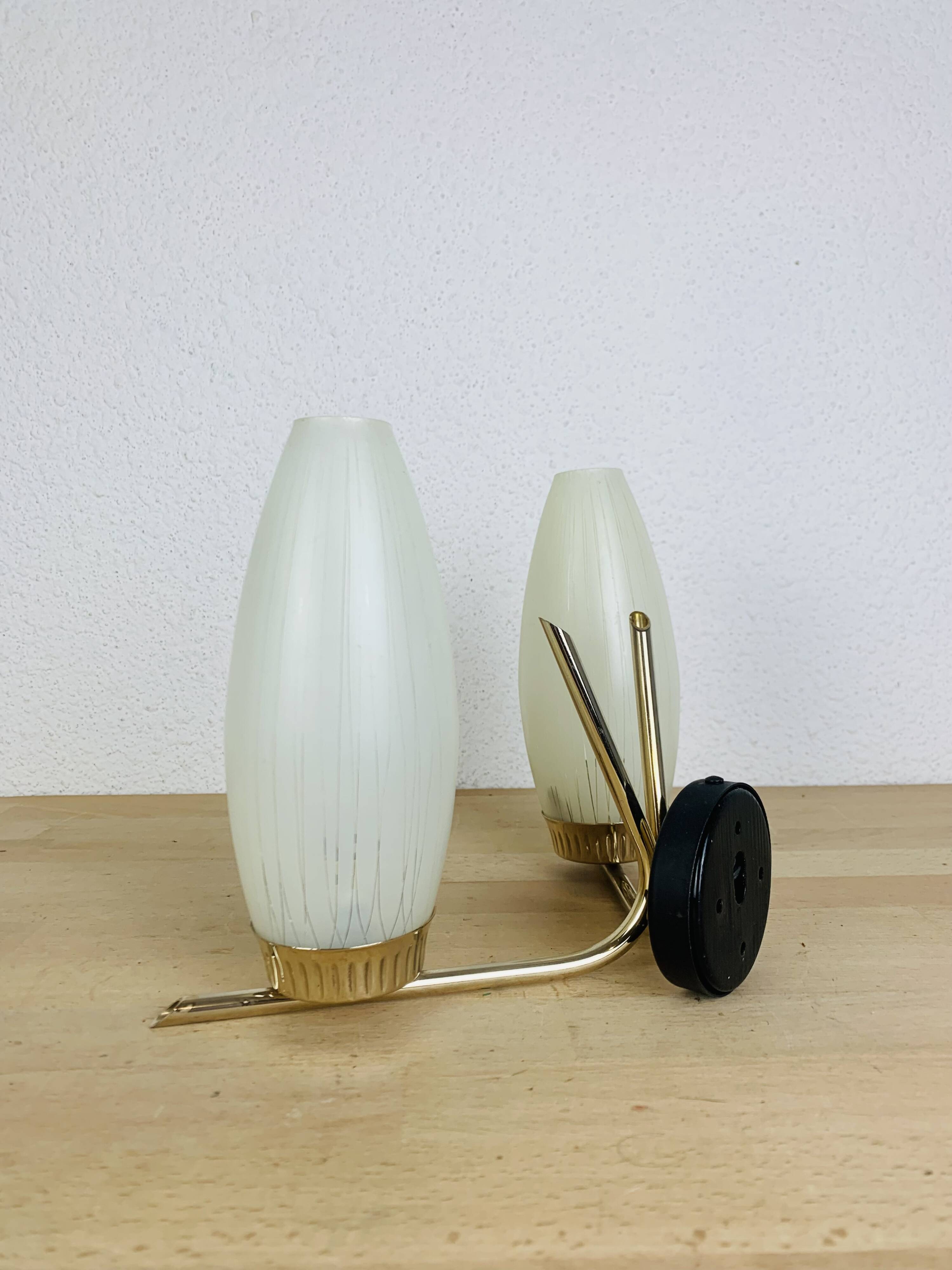 50s double-light wall light, brass and black metal, opaline tulips