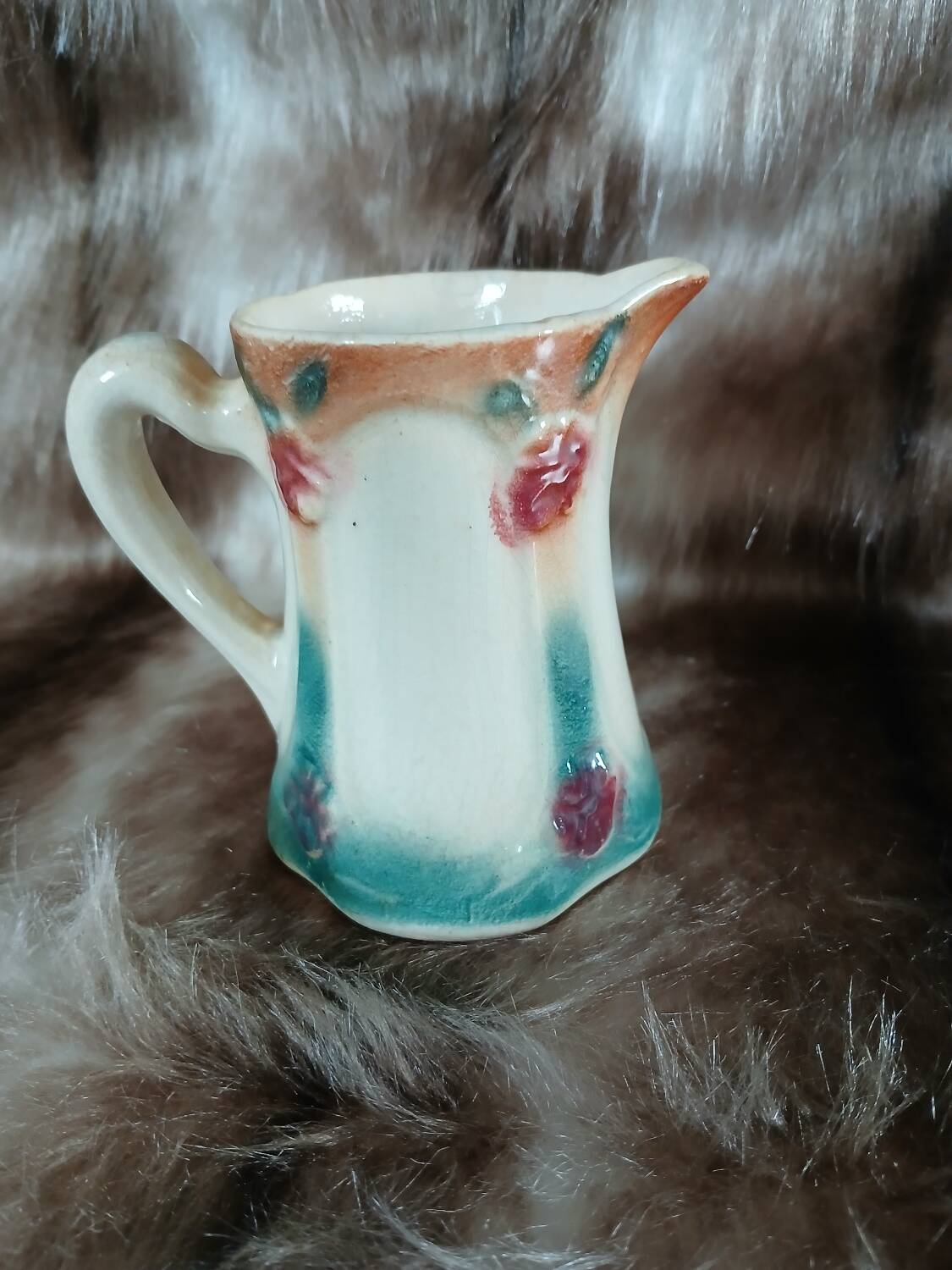 Antique slipware milk jug