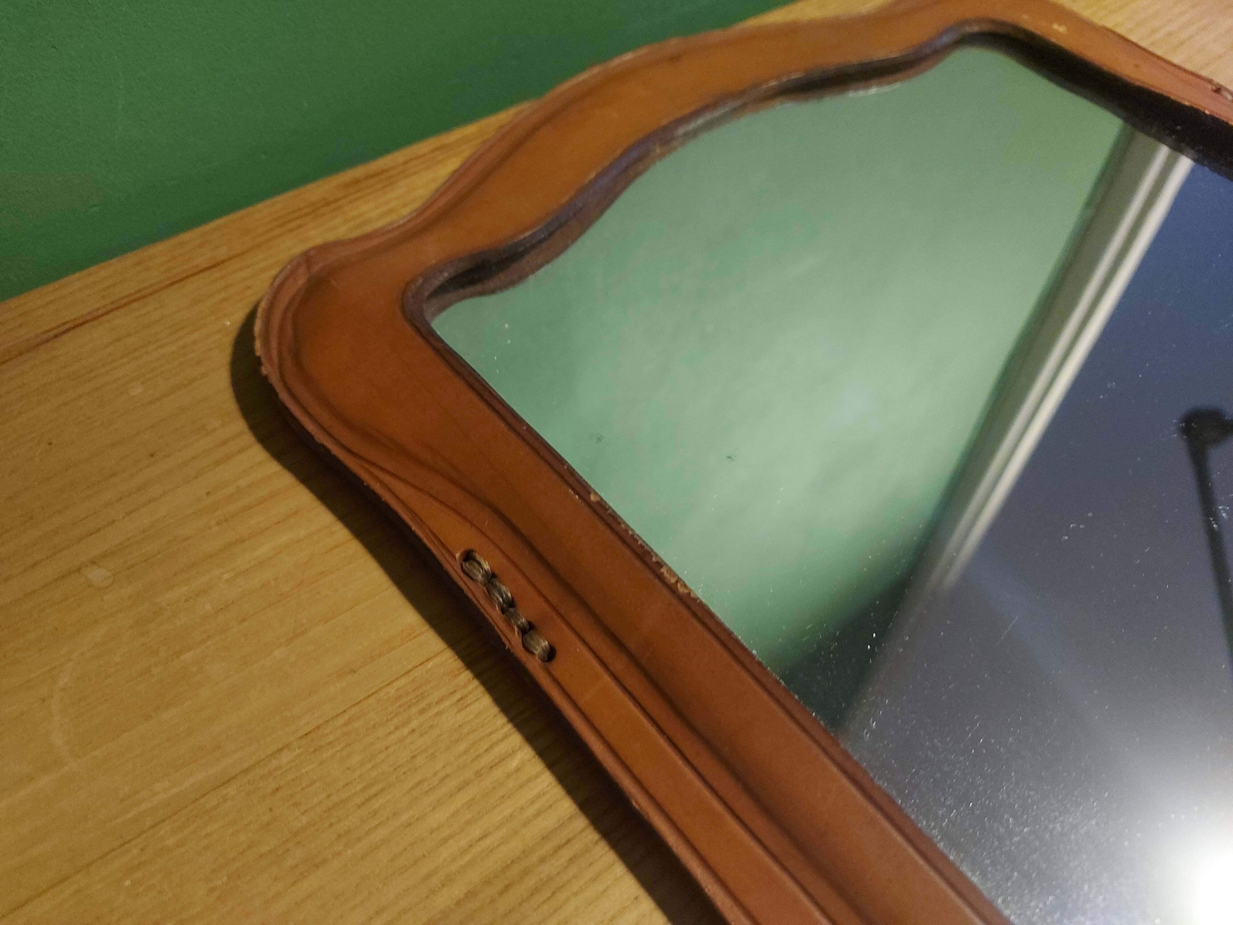 Vintage leather mirror