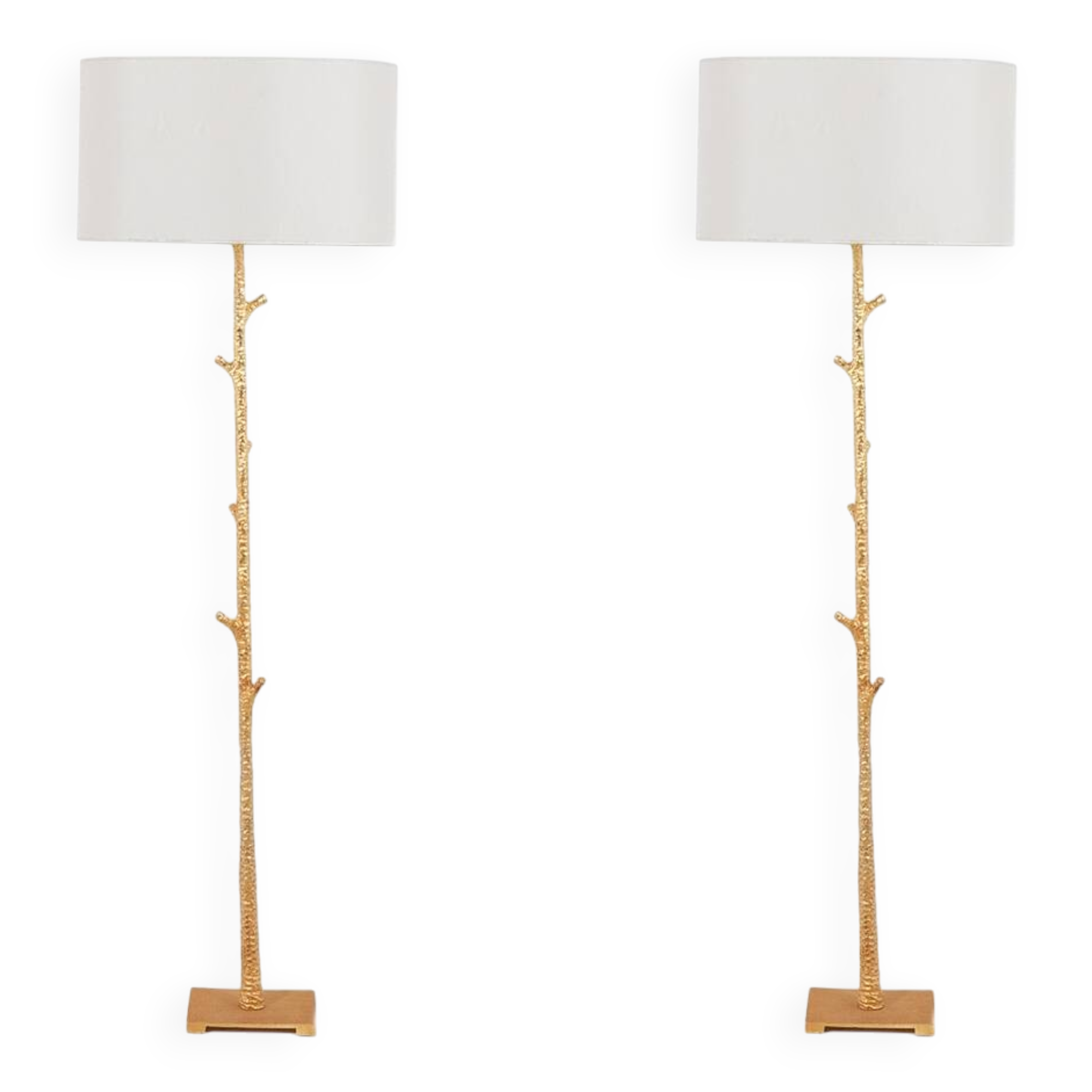 Pair of gilded metal floor lamps. 20th century.