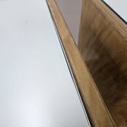 Pair of maple bedside tables from the 1950s with mirrored tops.
