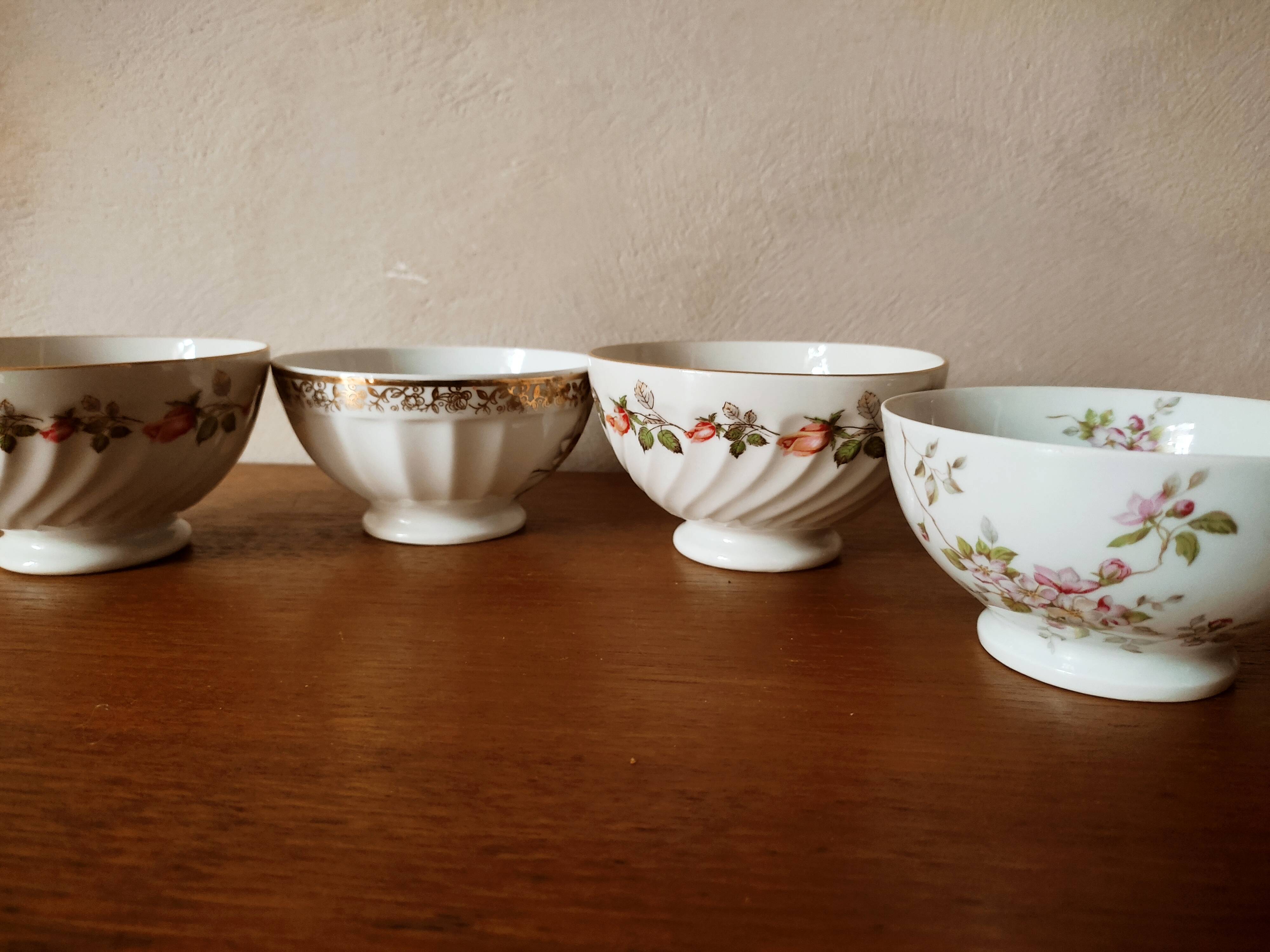 Set of 12 mismatched porcelain bowls