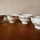 Set of 12 mismatched porcelain bowls