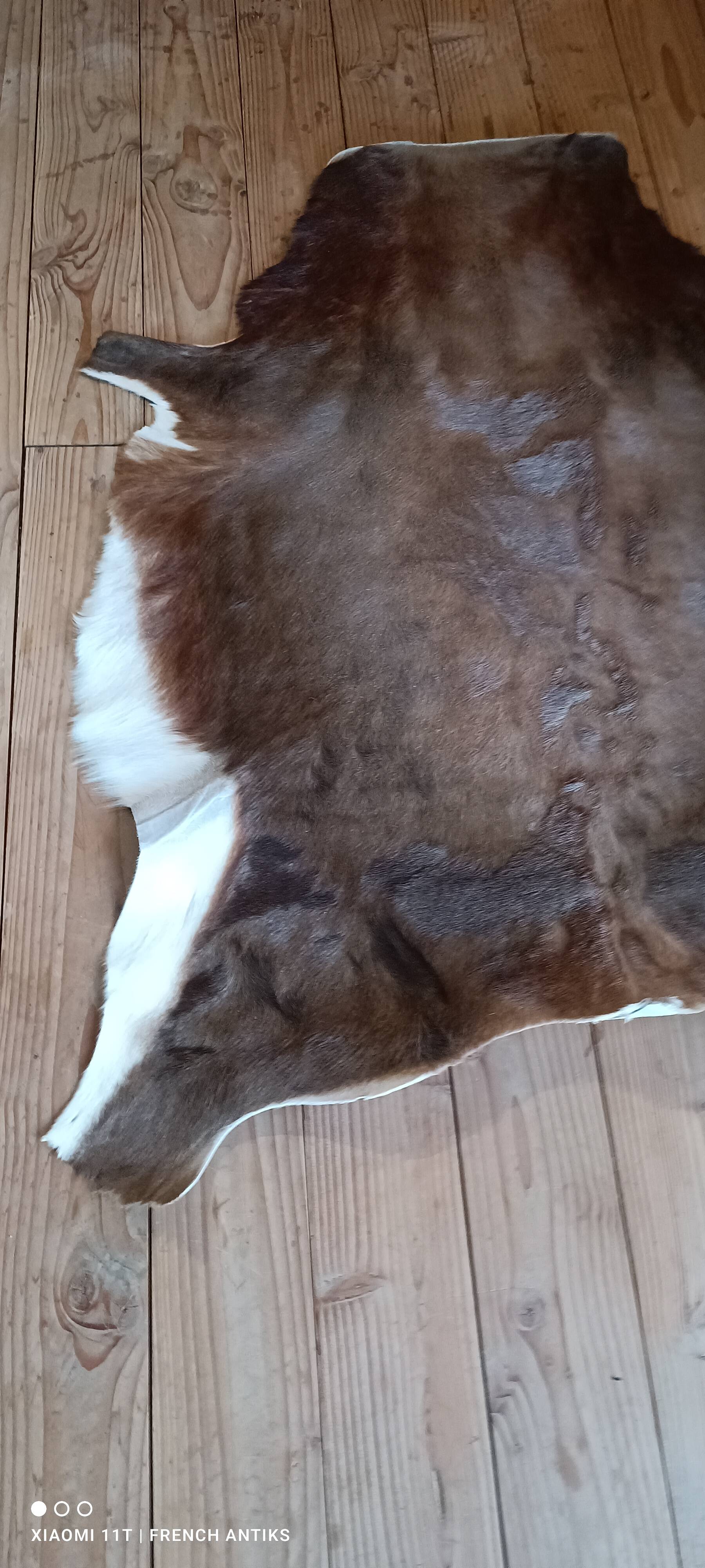 Cowhide rug, vintage from the 1980s. Handmade, made by me.
