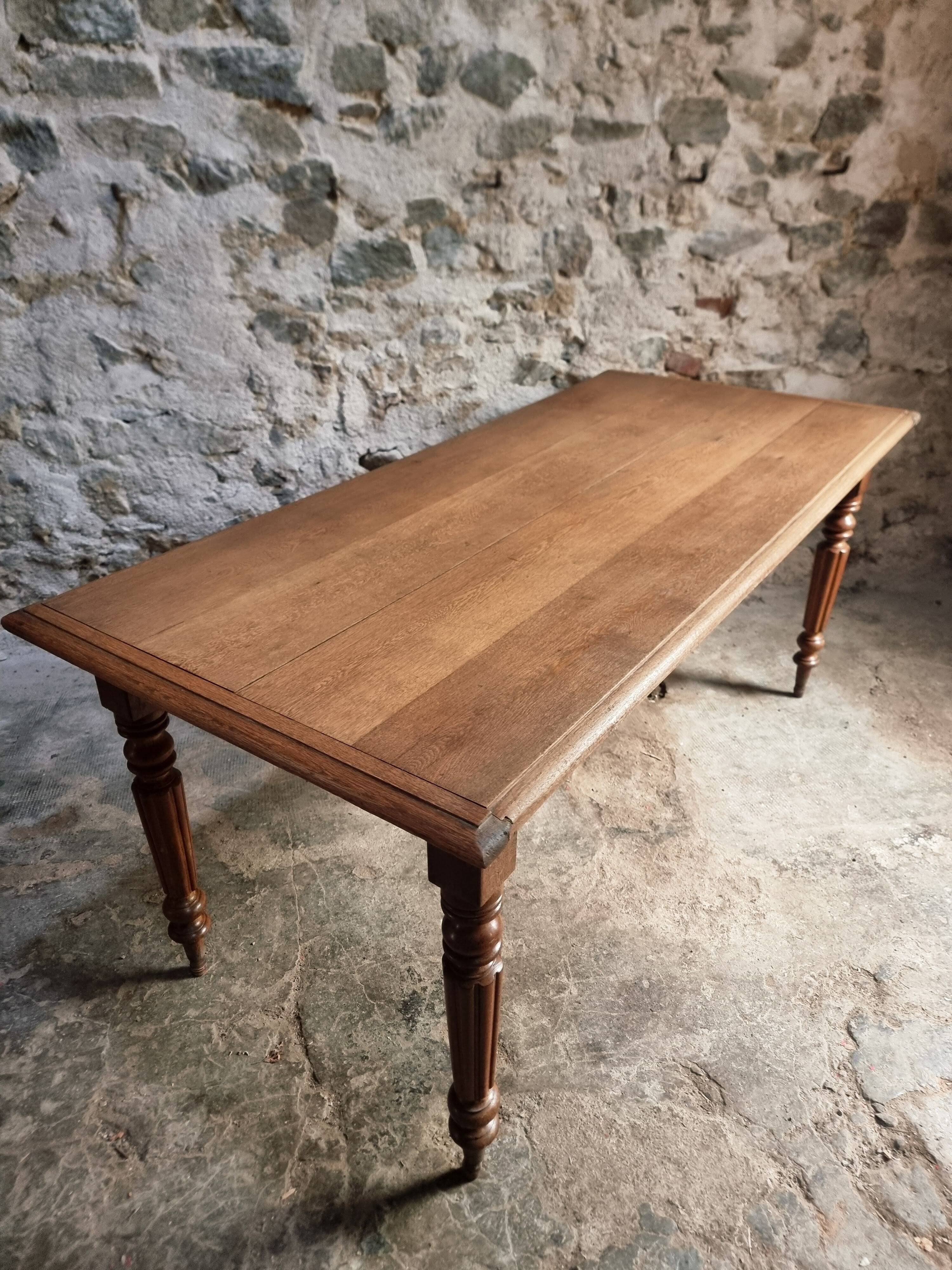 Antique oak dining table with drawer – France, early 20th century