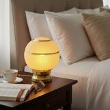 Pair of large art deco globe table lamps with brass legs