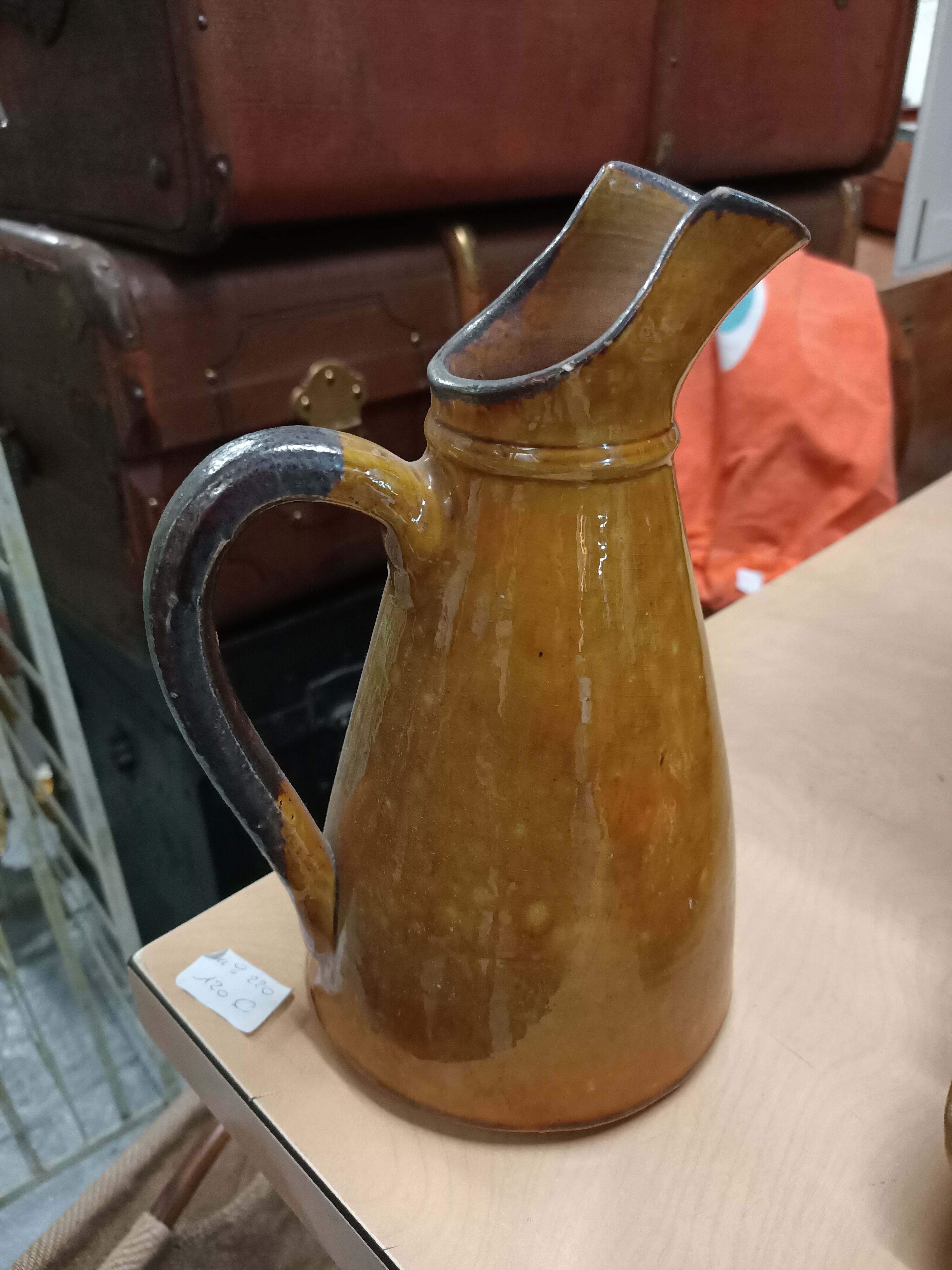 Enamelled terracotta jug