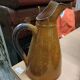 Enamelled terracotta jug