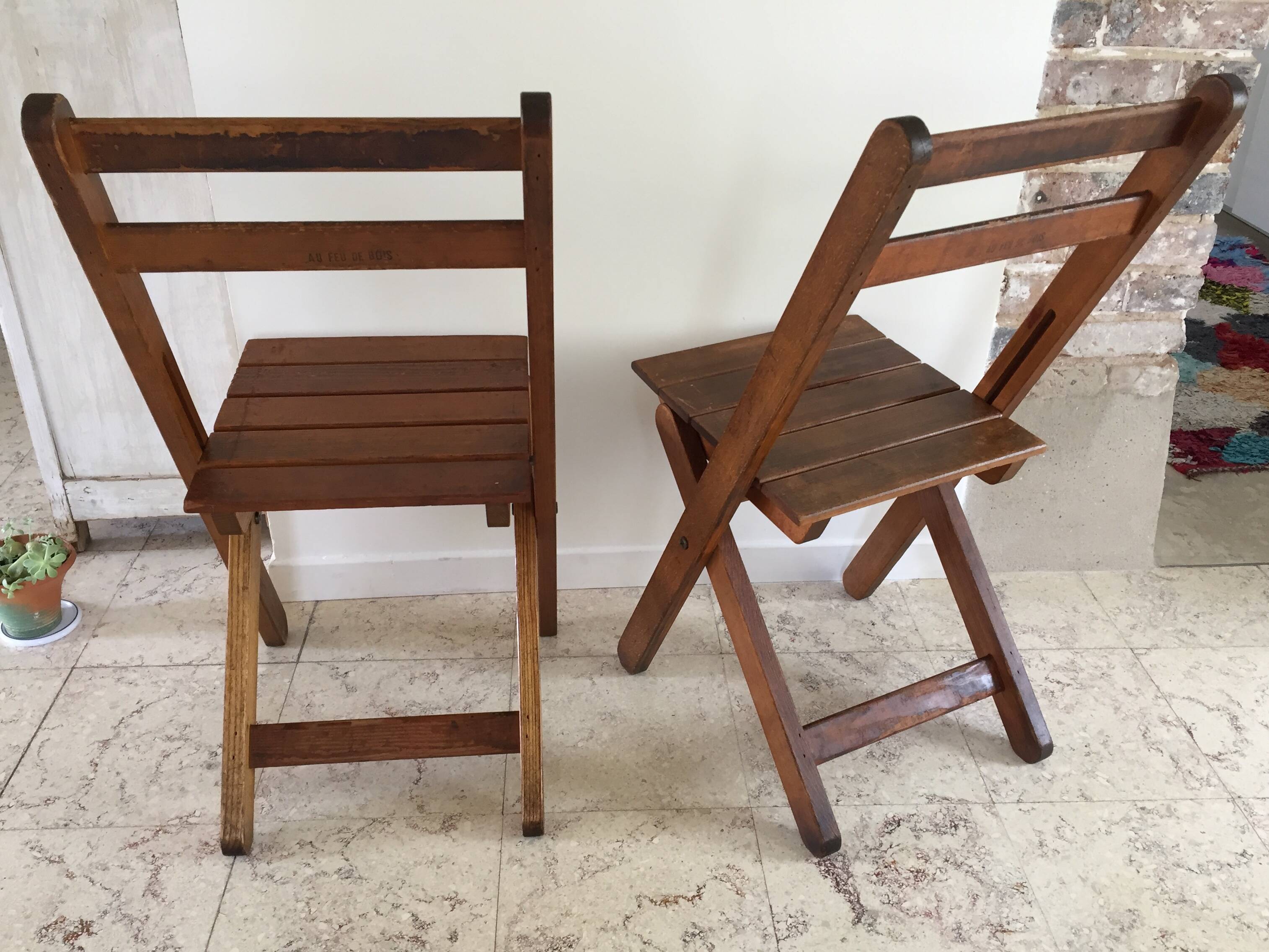 Folding chairs "by the wood fire"