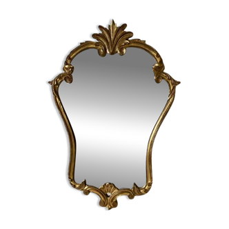 Antique gilded mirror in rococo style