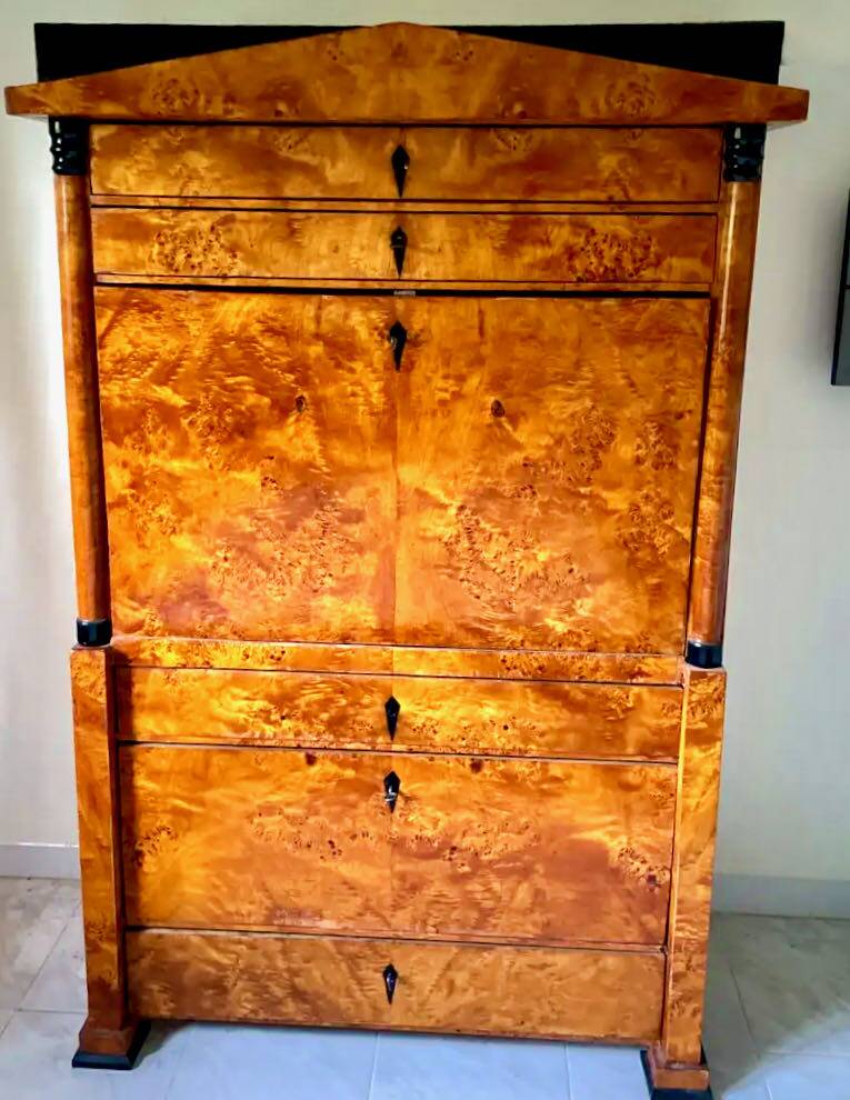 Secretary with a drop-leaf in pine and ebony, in Biedermeier style.