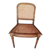 Caned armchair