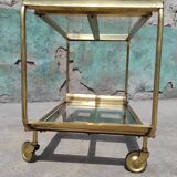 Old rolling coffee table serving vintage brass bar 50s mid-century design